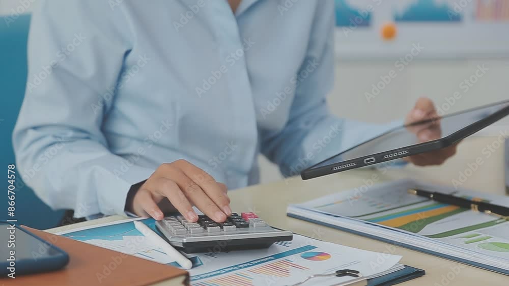 custom made wallpaper toronto digitalAsian Business woman using calculator and laptop for doing math finance on an office desk, tax, report, accounting, statistics, and analytical research concept