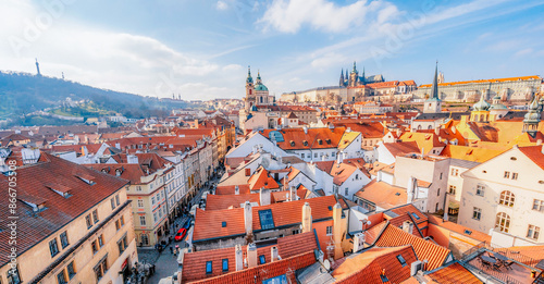 Canvas Print View of the city of Prague and the Vltava river with Charles bridge  from Malostranske bridge towers in Prague, Czech Republic