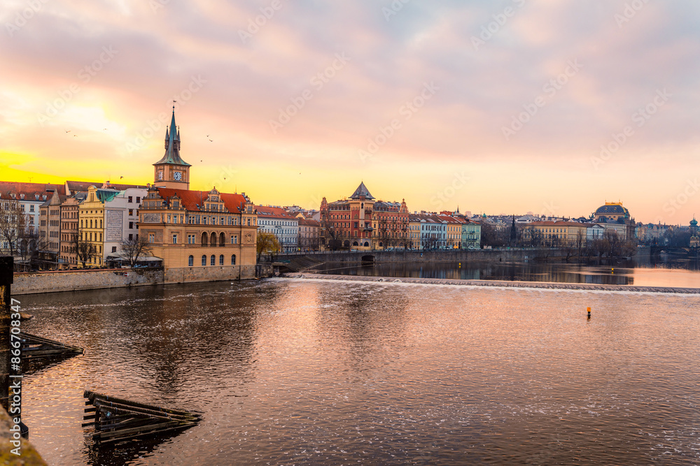 Obraz premium View of the city of Prague and the Vltava river with Old Town Bridge Tower on Charles bridge in Prague, Czech Republic.