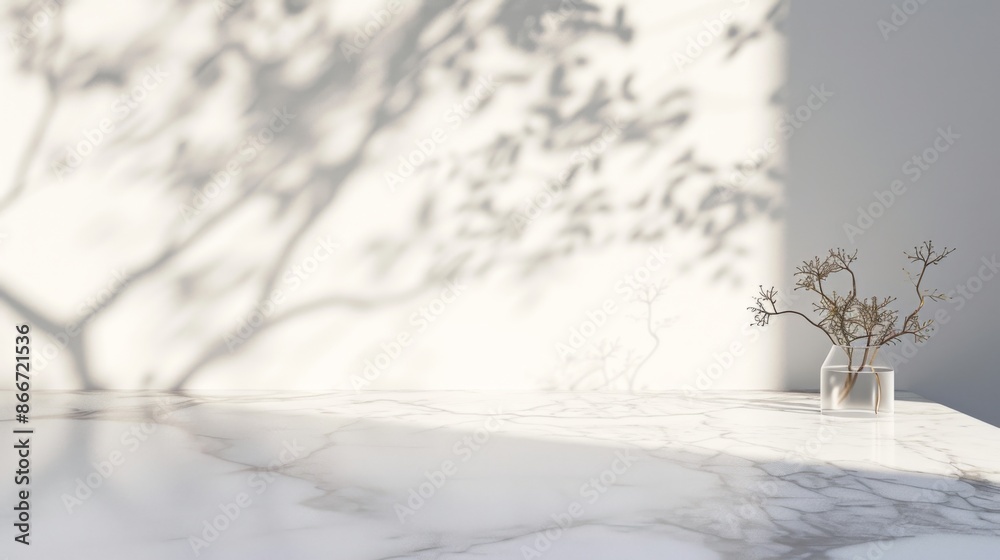 Fototapeta premium Marble table with the shadow of a tree falling on it against a white wall