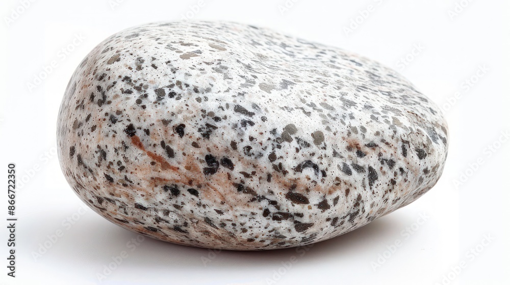 A rock with a black and white speckled surface. Generate AI image A rock with a black and white speckled surface. Generate AI image