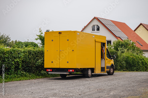 van delivers packages in the city © Katrin_Primak