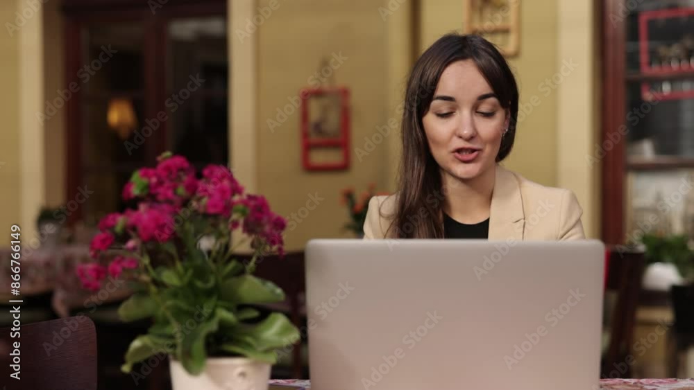Concentrated millennial, class lecture, consulting customer. Businesswoman making video call, looking at webcam, consulting her client from distance. Confident businesswoman leads job interview Concentrated millennial, class lecture, consulting customer. Businesswoman making video call, looking at webcam, consulting her client from distance. Confident businesswoman leads job interview