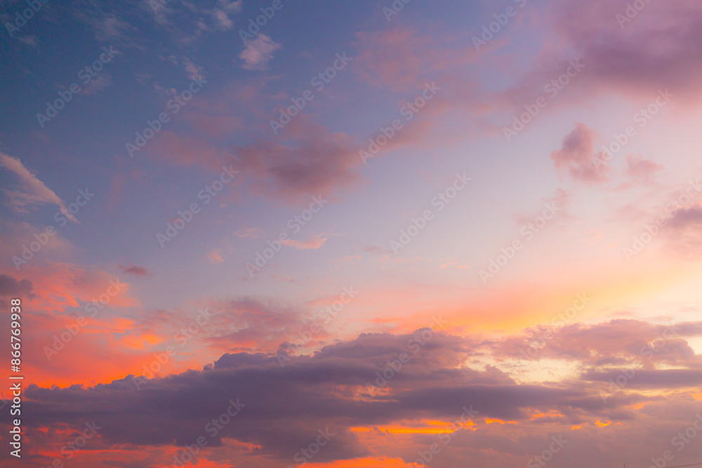 Clouds and sky in the evening,Real majestic sunrise sundown sky background with gentle colorful clouds without birds. Panoramic, big size Clouds and sky in the evening,Real majestic sunrise sundown sky background with gentle colorful clouds without birds. Panoramic, big size
