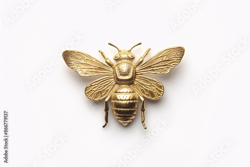 detailed golden bee brooch with intricate wings and body displayed on a white background