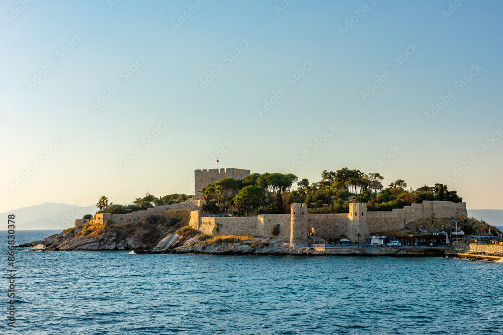 Guvercinada Island (Pigeon Island) and Guvercinada Castle in Kusadasi. Aydin, Turkey. Kusadasi is a popular tourist destination in Turkey. Guvercinada Island (Pigeon Island) and Guvercinada Castle in Kusadasi. Aydin, Turkey. Kusadasi is a popular tourist destination in Turkey.