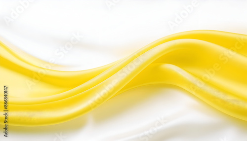 Yellow Satin Fabric Draped on White Background