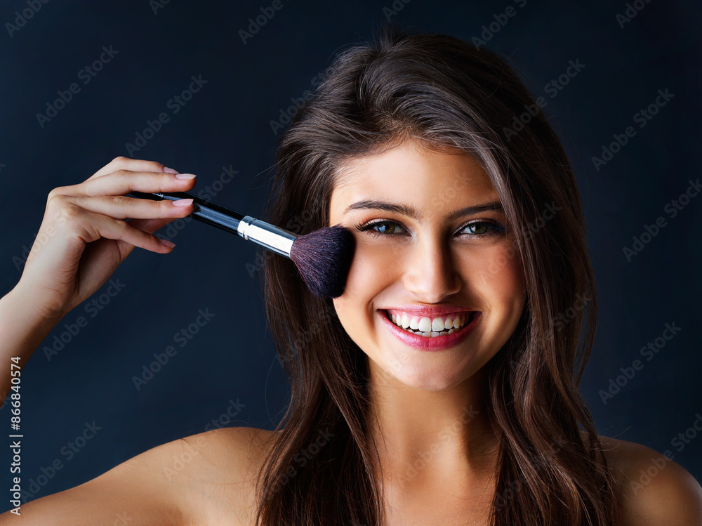 Obraz premium Woman, makeup and brush with portrait in studio for beauty glamour, salon and foundation product of transformation. Girl, smile and facial tool of cosmetic routine, aesthetic and blue background