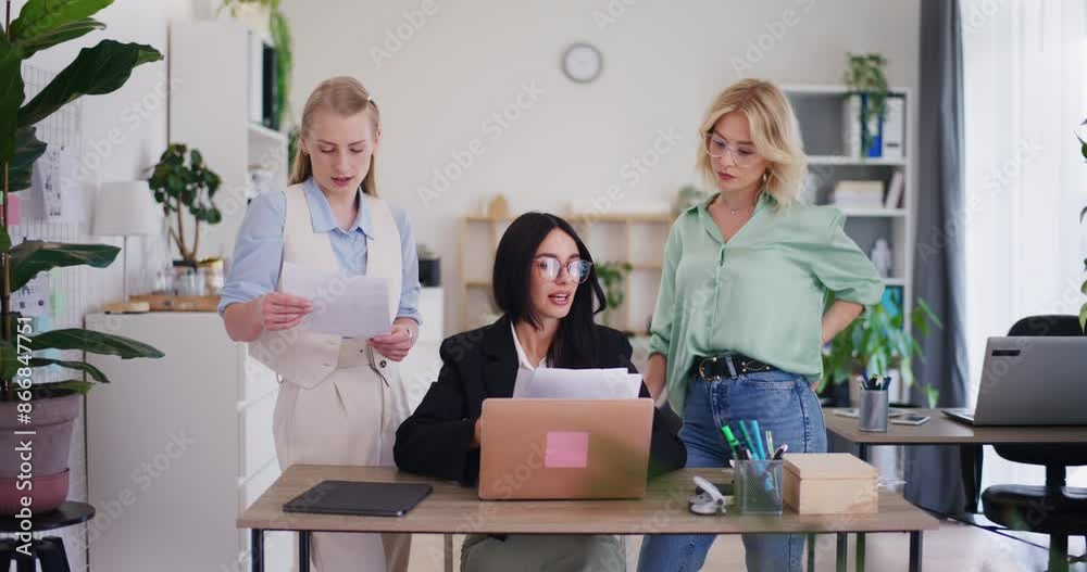 Team Manager Delegates Tasks to Employees in Office