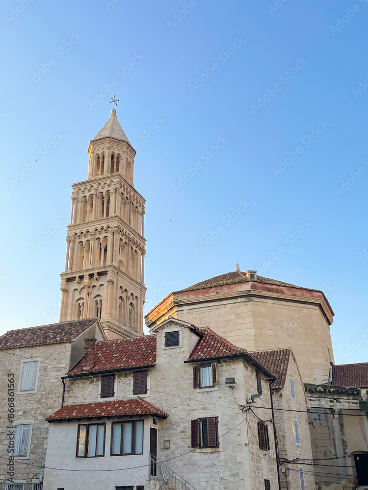 Fototapeta premium Rural houses in the center of Split and the bell tower of the Cathedral of Saint Dominion of Salona