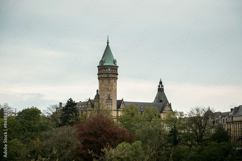 Outdoor view of the Clock Tower of Spuerkees Bank during the sunset in the city center of Luxembourg the capital of Grand Duchy of Luxembourg Outdoor view of the Clock Tower of Spuerkees Bank during the sunset in the city center of Luxembourg the capital of Grand Duchy of Luxembourg