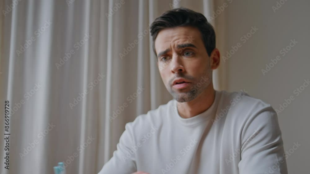 Worried freelancer video chatting at home discussing work problem closeup. Worried freelancer video chatting at home discussing work problem closeup.