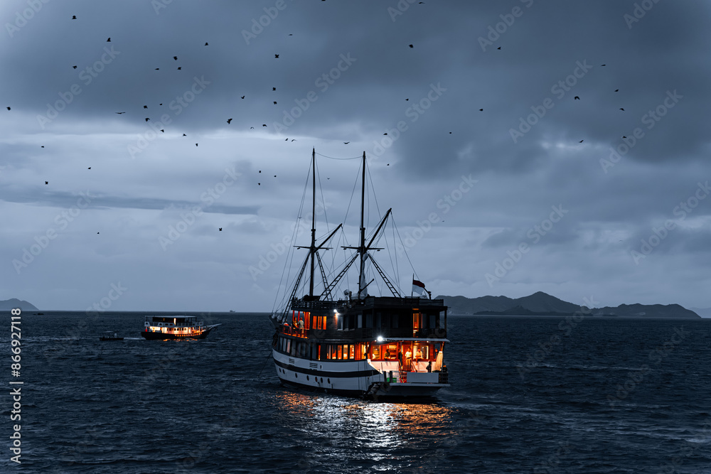 Blue hour image of live aboard boat in the komodo national park, indonesia Blue hour image of live aboard boat in the komodo national park, indonesia