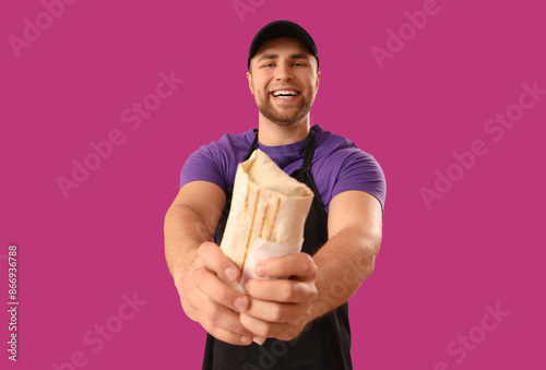 Chef with tasty doner kebab...