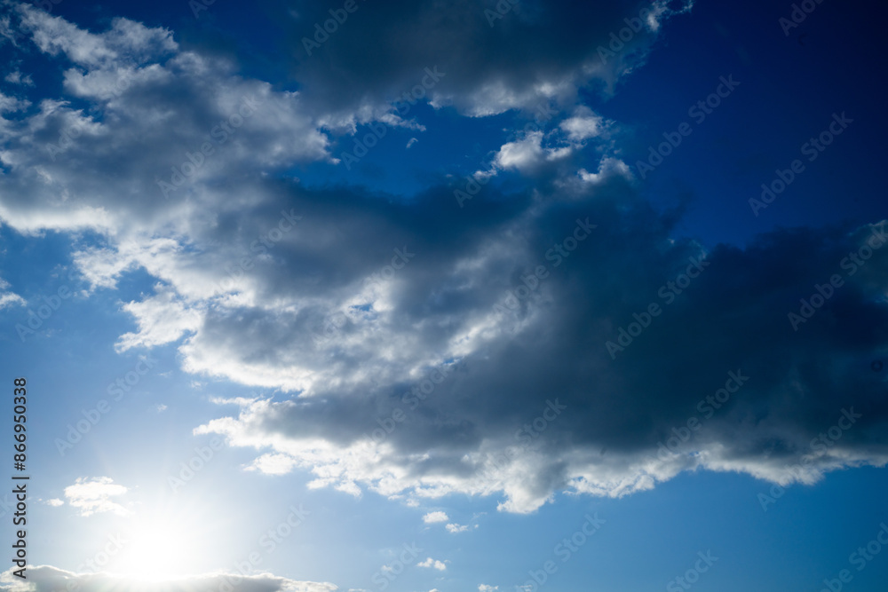bright sun sky cloud blue dark grey bright sun sky cloud blue dark grey