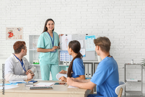 Female doctor working with ...