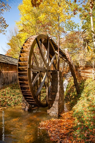 A water wheel powering a grist mill at  the Georgia Mountain fair in Hiawassee, Georgia photo