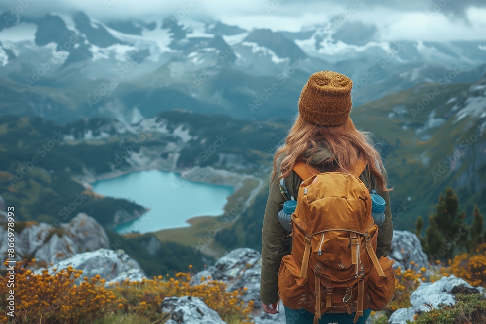 Woman Admires Mountainous View With Backpack After Hike