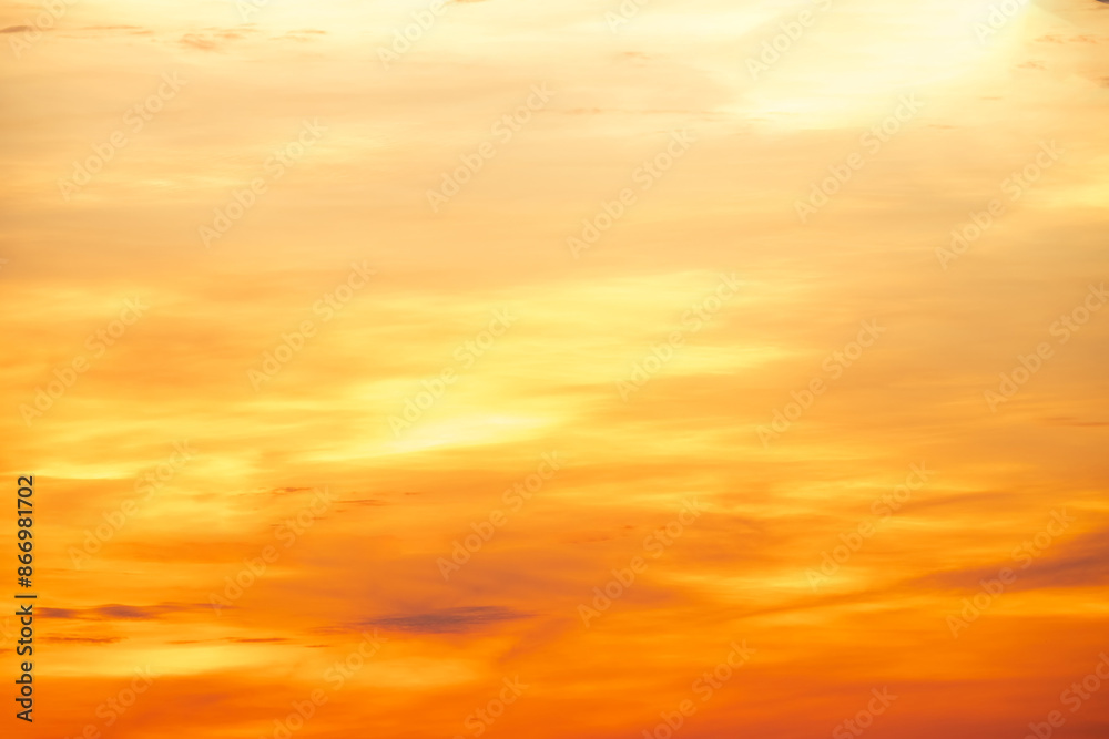 Beautiful , luxury soft gradient orange gold clouds and sunlight on the blue sky perfect for the background, take in everning,Twilight, Large size, high definition landscape photo Beautiful , luxury soft gradient orange gold clouds and sunlight on the blue sky perfect for the background, take in everning,Twilight, Large size, high definition landscape photo