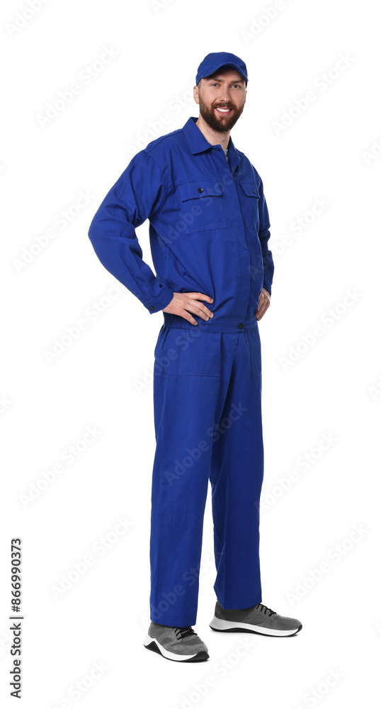 Professional auto mechanic in blue uniform on white background Professional auto mechanic in blue uniform on white background
