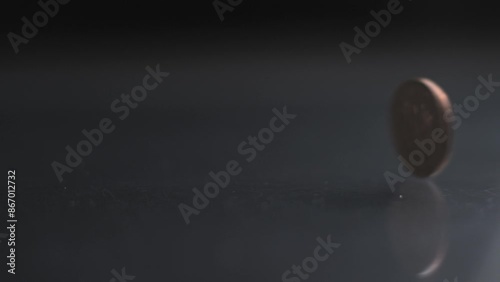 One Penny coin rotating slow motion, 0,01 £