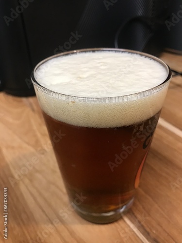 Copo de Cerveja Gelada com Espuma Cremosa, Ideal para Momentos de Confraternização e Lazer. Copo de Cerveja Artesanal com Espuma Perfeita, Ideal para Apreciadores de Cerveja. Copo de Cerveja Fresca co photo