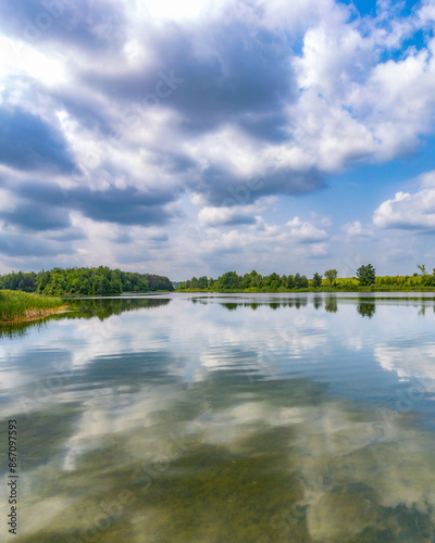 Beautiful reflection of the sky in a lake - Orangeville Reservoir in Island Lake Conservation Area. Ontario Canada