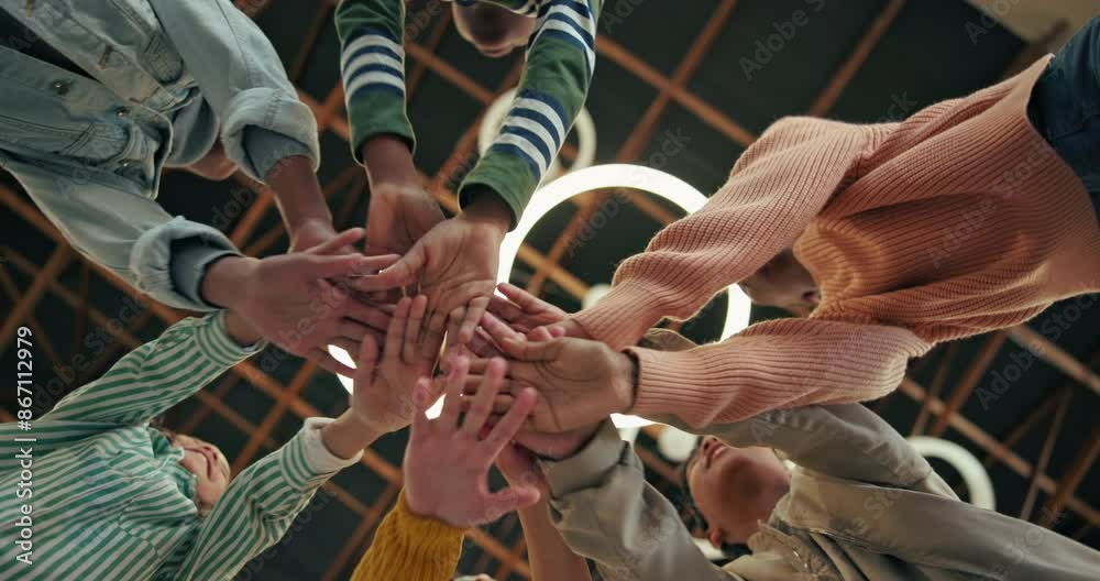 Students, stack and hands for education, teamwork and collaboration for solidarity in school. Teenagers, diversity and equality for learning, cheering and support with cooperation by lower angle