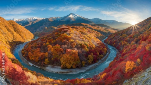 Tranquil fall riverbank with maple trees displaying their vibrant red foliage