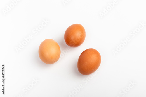 Brown eggs on a white background