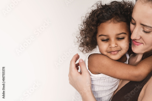 Tableau sur toile Interracial family having fun on white background