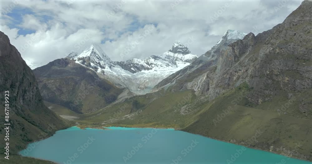 Turquoise waters of Paron lake surrounded by rugged Andean mountains Turquoise waters of Paron lake surrounded by rugged Andean mountains