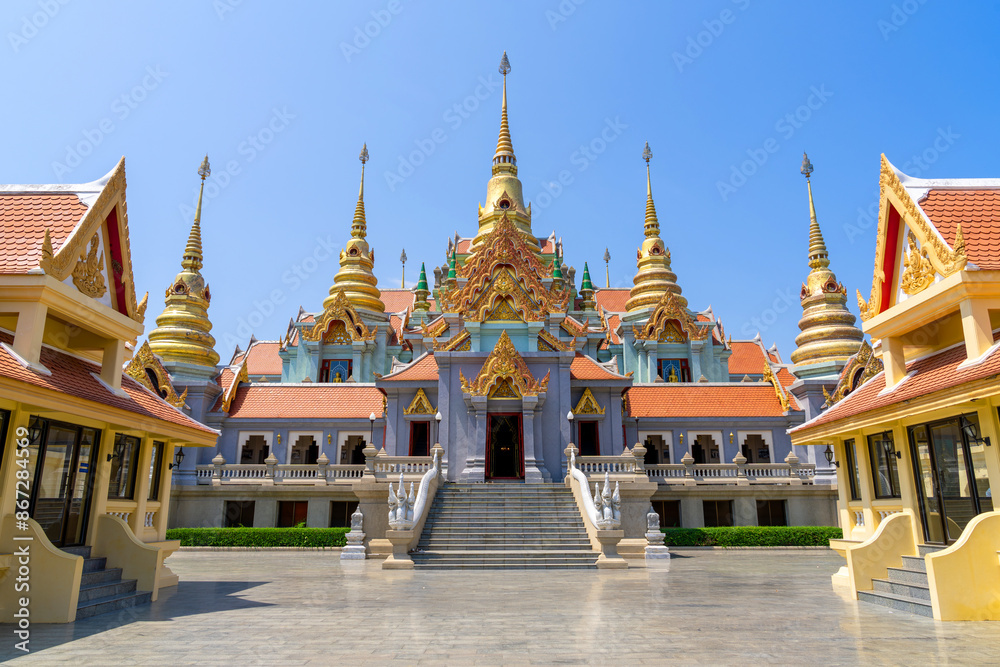 Fototapeta premium Ubosot of Wat Phra Mahathat Chedi Phakdi Prakat, a beautiful temple near the sea in Prachuap Khiri Khan Province.