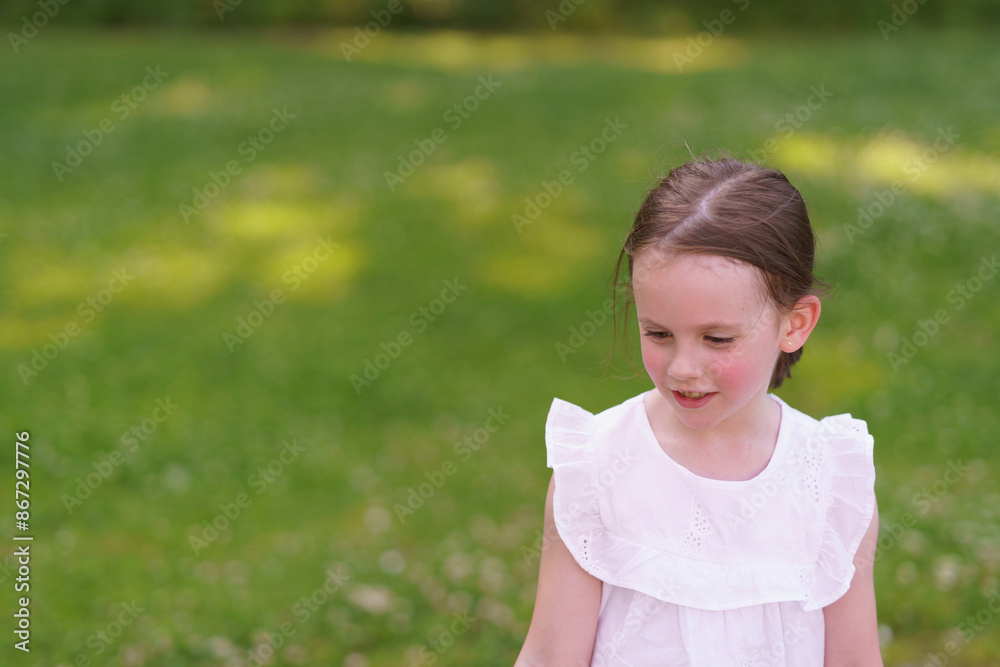 Preschool girl with a missing tooth delighting in playground adventures on a hot day. Preschool girl with a missing tooth delighting in playground adventures on a hot day.
