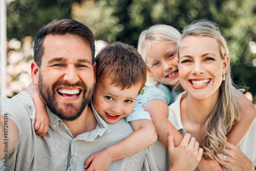 Selfie, family and happy with piggyback in garden at home for bonding, support and care. Parents, kids and smile on portrait for child development or growth with creating memories for social media