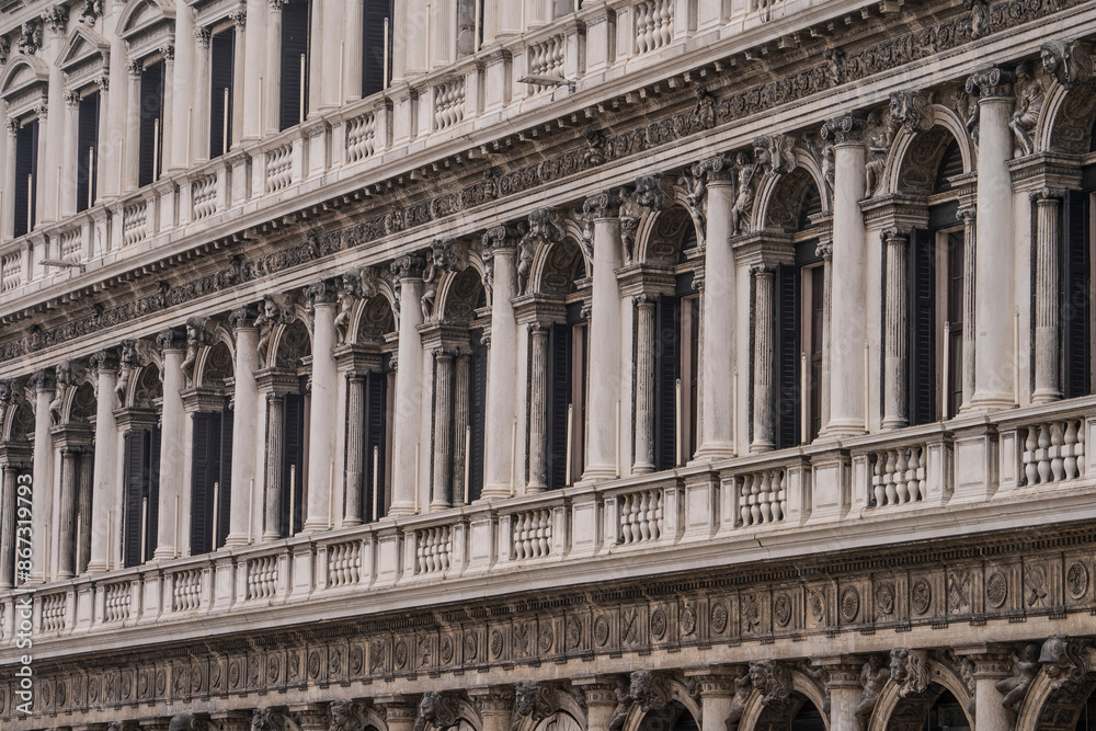 Fototapeta premium The long Arcade, known as the Procuratie Vecchie on the north side of St Mark's Square, piazzetta facade - Doges palace in Venice, Italy 04.01.2024