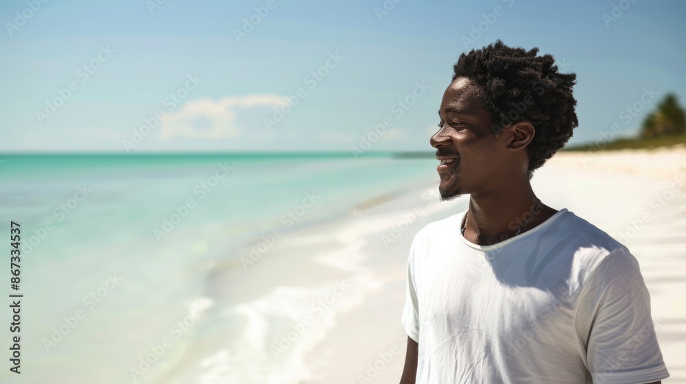 close-up man young african american smiling walking on beach close-up man young african american smiling walking on beach