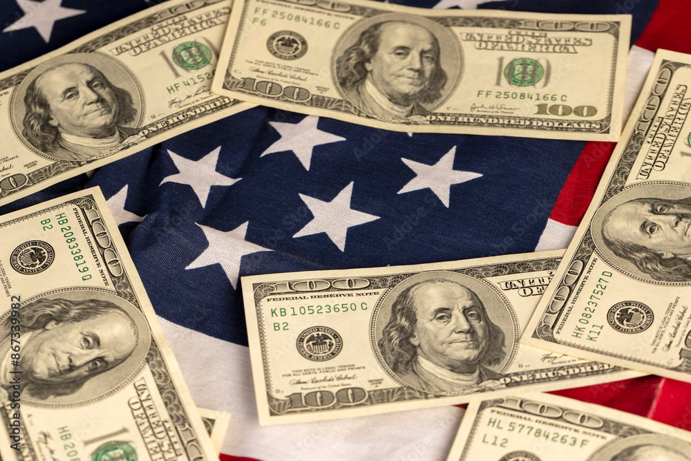 American dollars and the American flag American dollars and the American flag