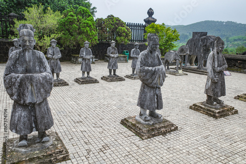 Hue, Vietnam - 6 Feb, 2024: Guardian figures at the Mausoleum of Emperor Khai Dinh, in Hue, Vietnam photo