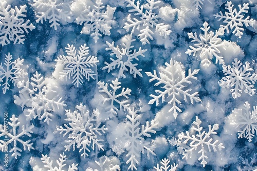 A pattern of snowflakes, each unique but together forming a blanket of snow