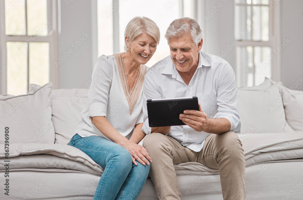 Senior couple, smile and tablet on sofa for planning retirement, love relationship and social network in home. Happy, mature woman and man with tech for pension website, online movie and bonding Senior couple, smile and tablet on sofa for planning retirement, love relationship and social network in home. Happy, mature woman and man with tech for pension website, online movie and bonding