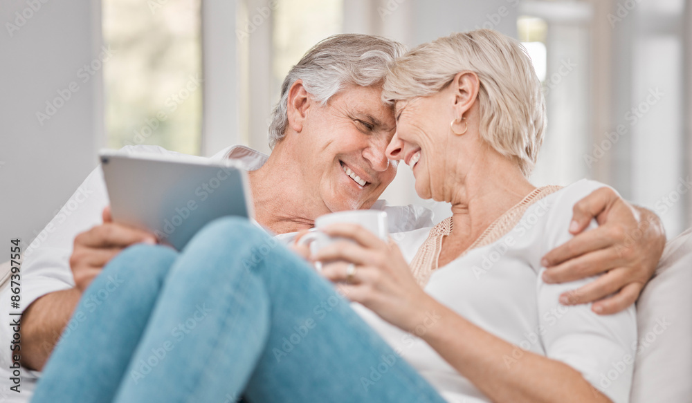 Senior couple, tablet and love on sofa for relax, retirement and connection or online in home. Technology, elderly man and woman on couch for communication, streaming and watch movies in apartment Senior couple, tablet and love on sofa for relax, retirement and connection or online in home. Technology, elderly man and woman on couch for communication, streaming and watch movies in apartment