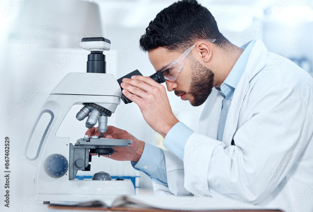 Man, microscope and examine research in lab, biochemist and innovation healthcare study with virus sample. Investigation, cure development and disease analysis or breakthrough, medical and equipment Man, microscope and examine research in lab, biochemist and innovation healthcare study with virus sample. Investigation, cure development and disease analysis or breakthrough, medical and equipment