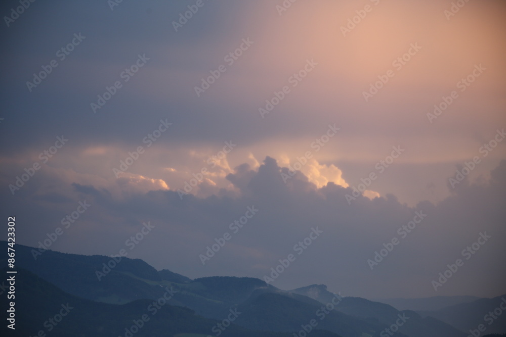 beautiful cloudy sunset creating pink and orange clouds. beautiful cloudy sunset creating pink and orange clouds.
