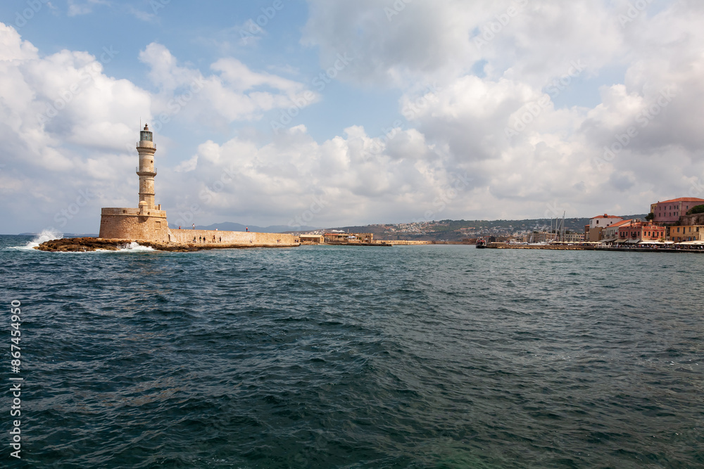 Lighthouse at old venetian harbor of Chania, Chania, Crete, Greece Lighthouse at old venetian harbor of Chania, Chania, Crete, Greece