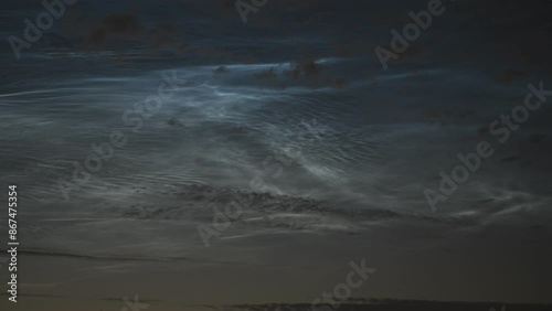 Time lapse of moving noctilucent clouds (NLC) during the period of the shortest nights. Tiny waves, whirls and curls of electric blue night time clouds at a height of abour 70 kilometers.