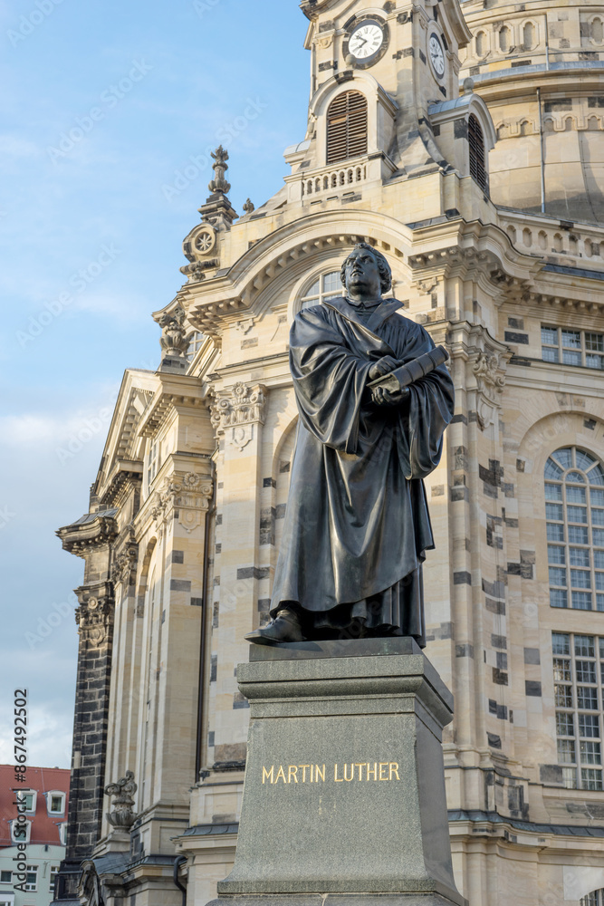Fototapeta premium Monument to the reformer Martin Luther in front of the Frauenkirche in Dresden