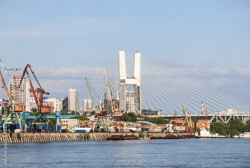 Novosibirsk, Novosibirsk region, Russian Federation - June 01 2024. Cable-stayed bridge and view of the river port Novosibirsk, Novosibirsk region, Russian Federation - June 01 2024. Cable-stayed bridge and view of the river port