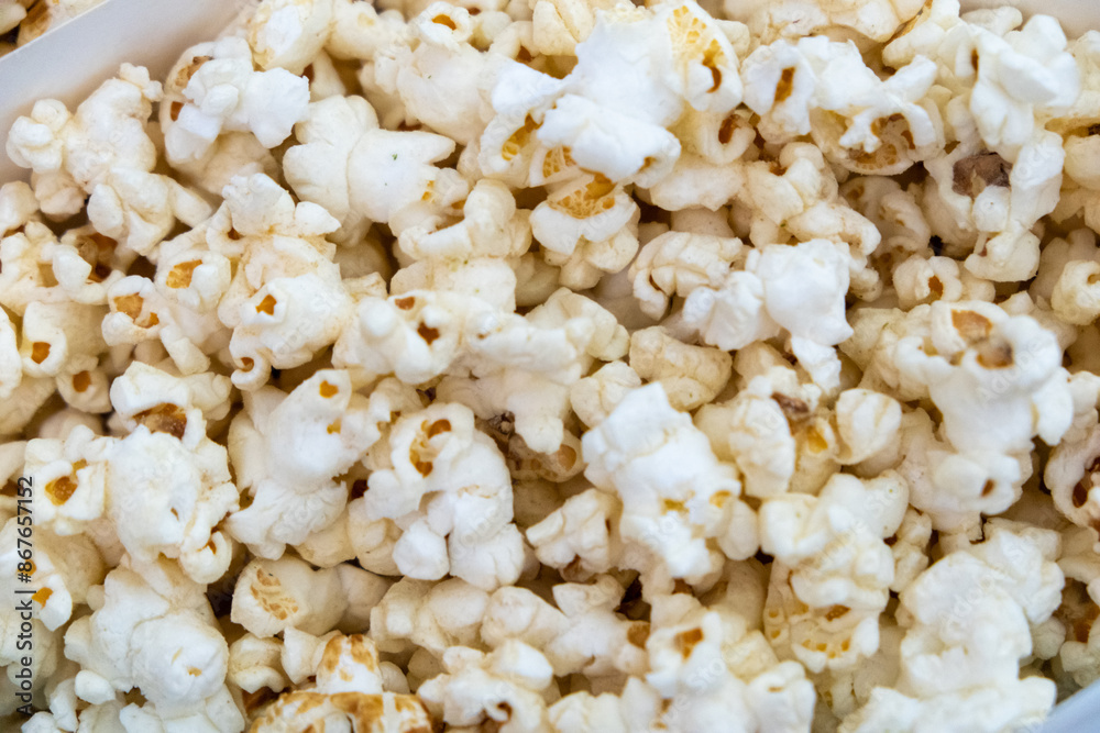 Close-up view of popcorn, for food-related contents, snacks, or movie night Close-up view of popcorn, for food-related contents, snacks, or movie night