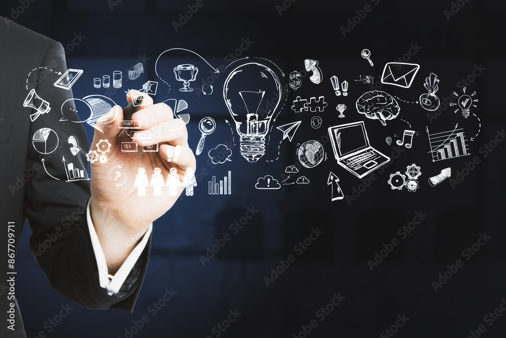 A person in a suit drawing creative business strategy doodles on a dark background, concept of idea generation and planning A person in a suit drawing creative business strategy doodles on a dark background, concept of idea generation and planning